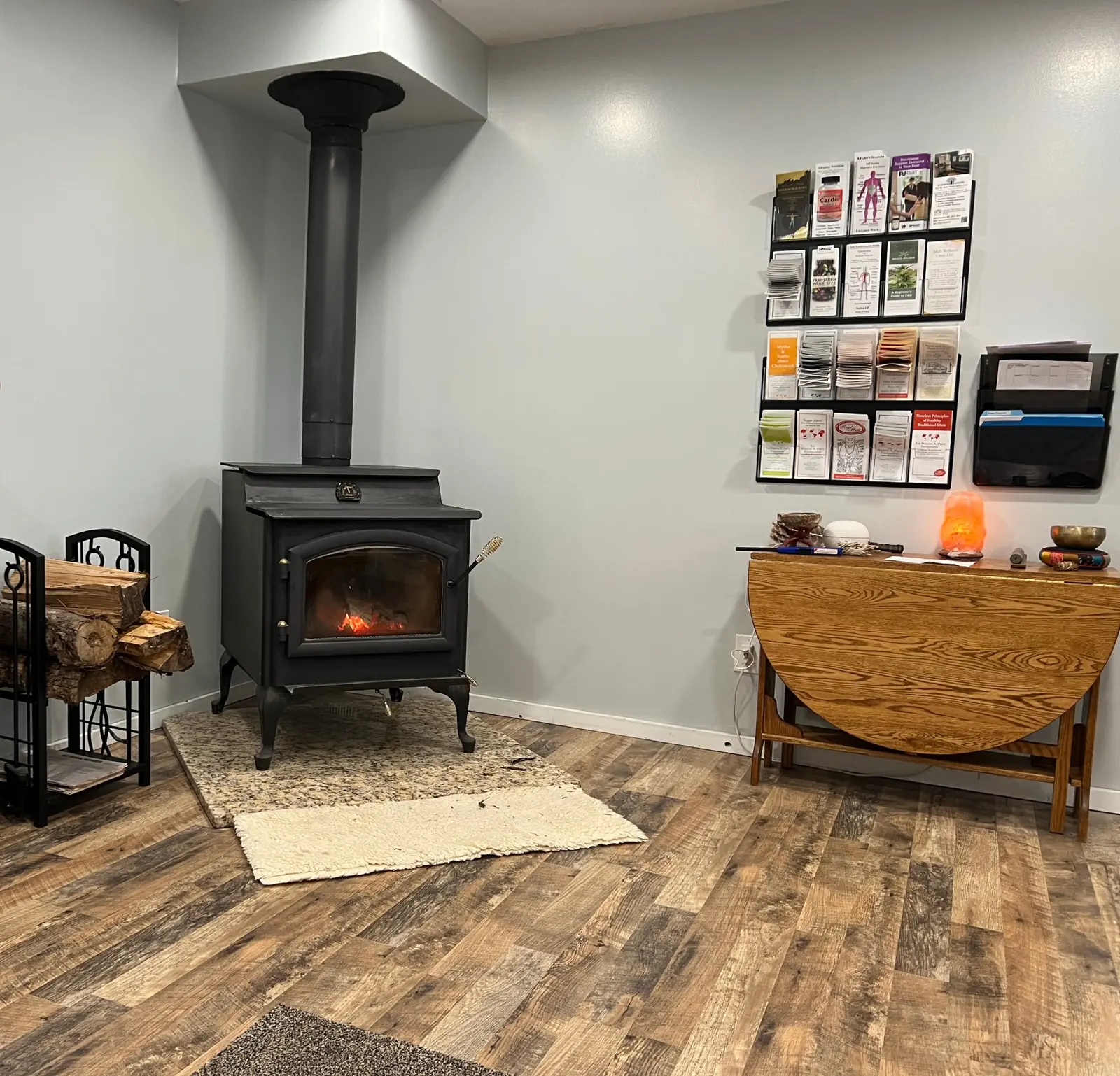 The waiting room at the center, with a wood stove burning in the corner